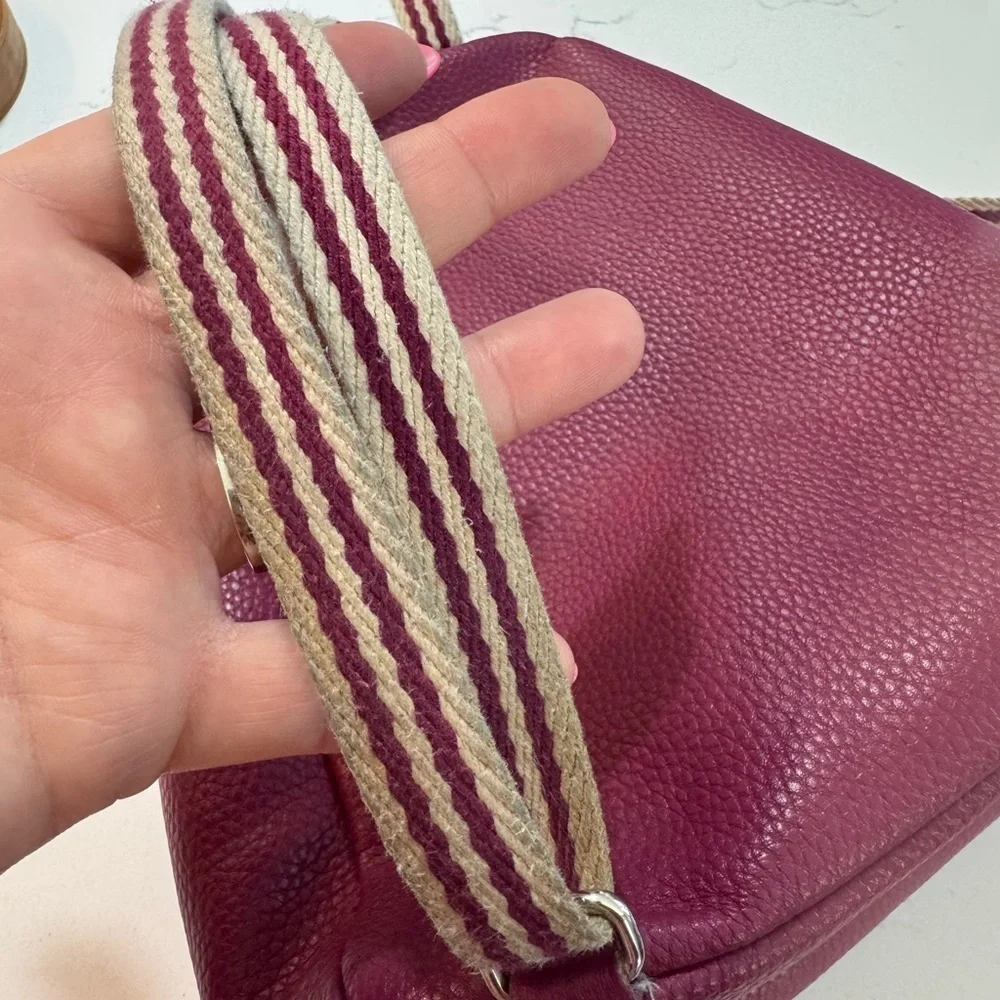 Jewell small backpack purse.  Purple in color. Good used condition.